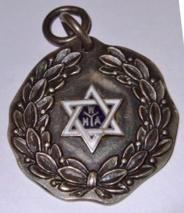 Item 8804. YWHA SILVER MEDAL, 1916-1917 ALL ROUND GYM CHAMPS.